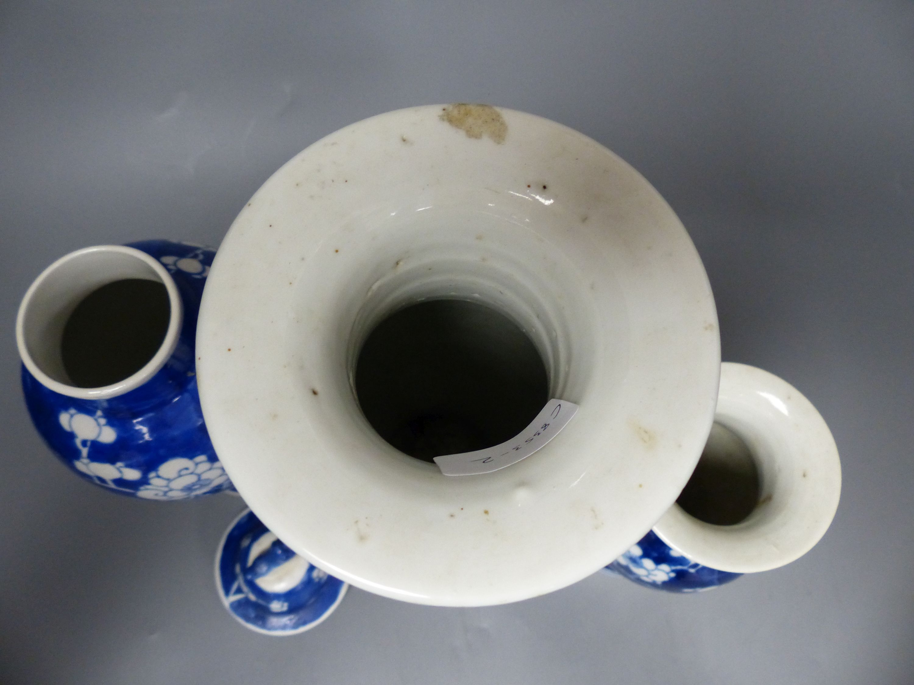 Three similar 19th/20th century Chinese blue and white vases, tallest 30cm